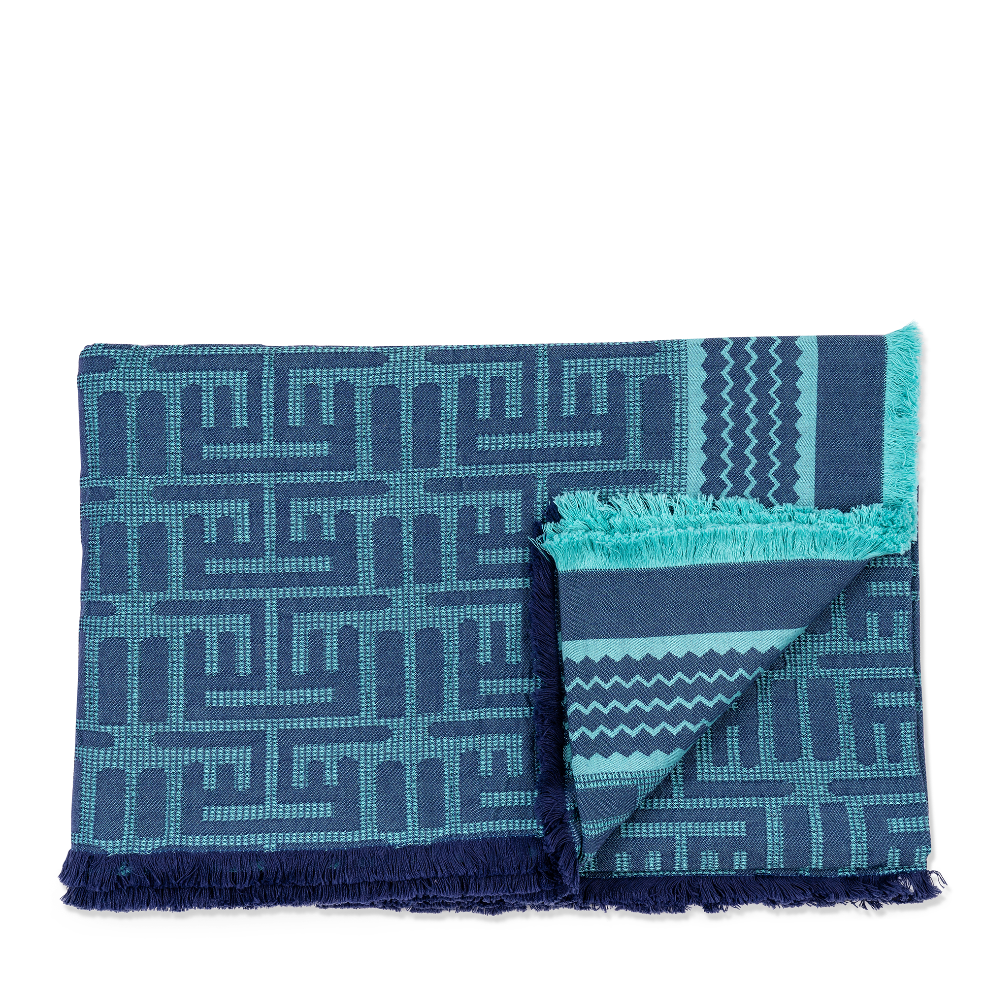 A blue and turquoise beach mat with a geometric pattern, featuring 100% cotton fabric. This beach mat is lightweight and portable, ideal for beach outings and picnics.