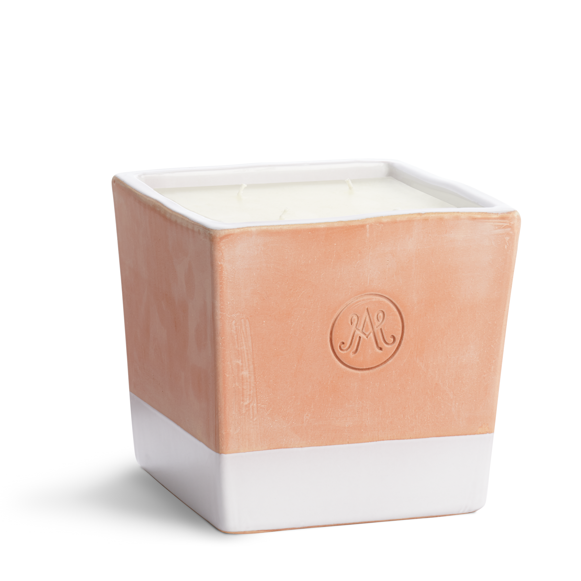 Outdoor Candle in a refillable terracotta and white enamel vessel, scented with a touch of honey and freshly cut grass.