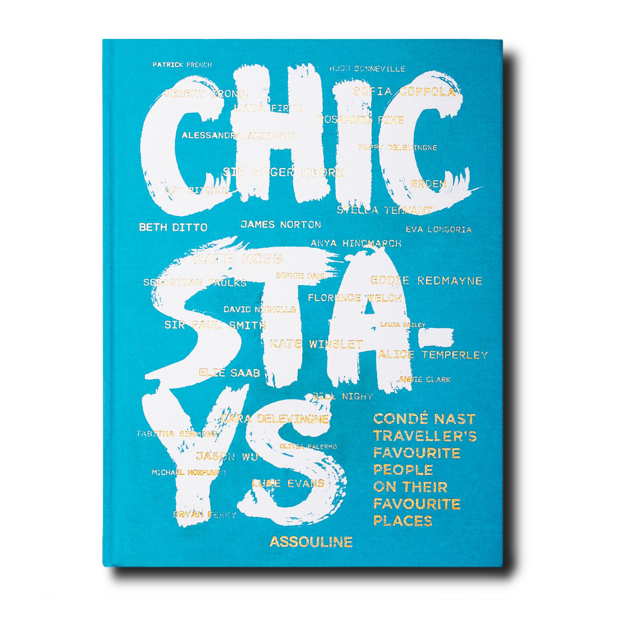A chic stays book with a blue and white cover, adds a decorative touch to your interior, and features thirty-six stories of breathtaking global locations. Its photography highlights destinations like UXUA Casa Hotel & Spa and the hills of Sri Lanka, inspiring readers to explore these beautiful spots.