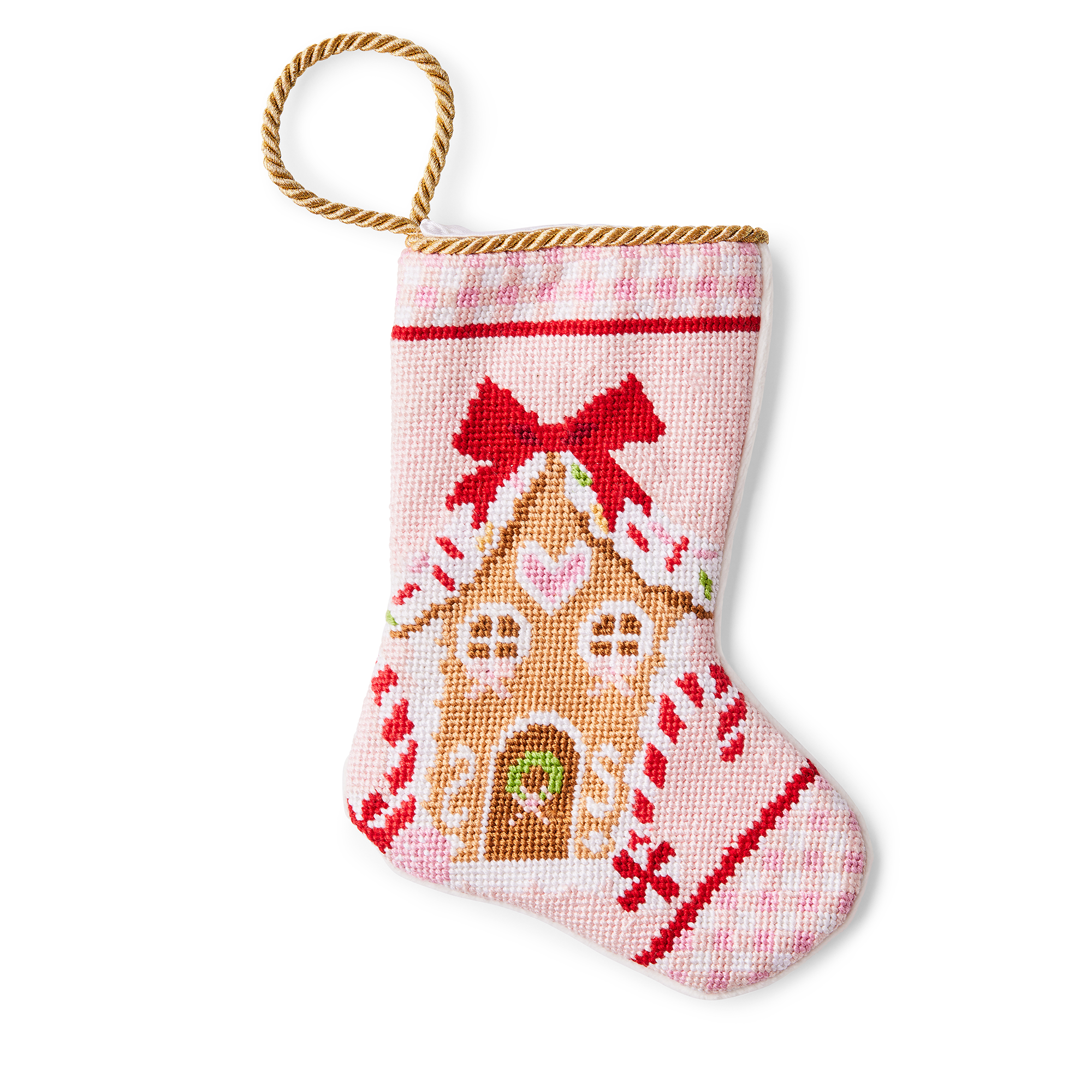 A charming Christmas stocking, featuring an illustrated gingerbread house adorned with festive decorations. The delightful design includes colorful candies, lollipop, and a snowy roof, creating a whimsical holiday scene. A gold loop is perfect for hanging by the fireplace.