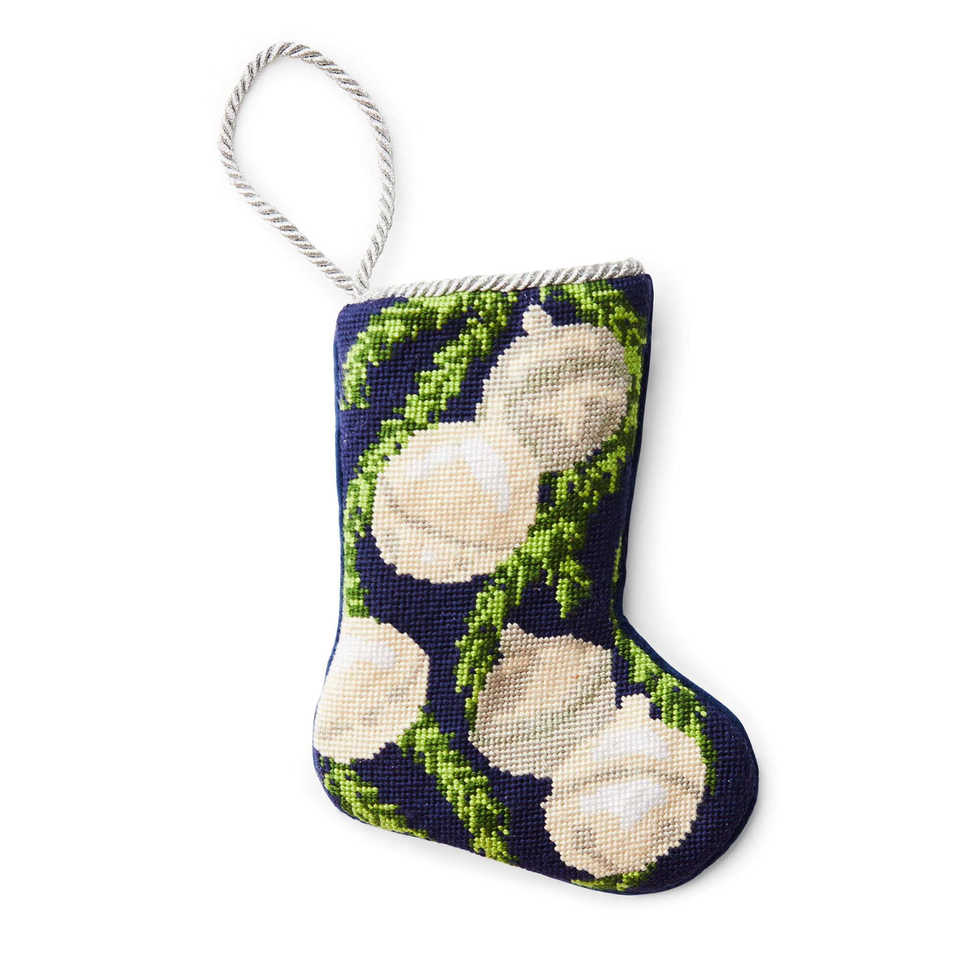 A small, intricately designed needlepoint stocking featuring silver bells against green branches and dark blue background. A gold loop at the top makes it perfect as a tree ornament, place setting, or for hanging by the fireplace. 