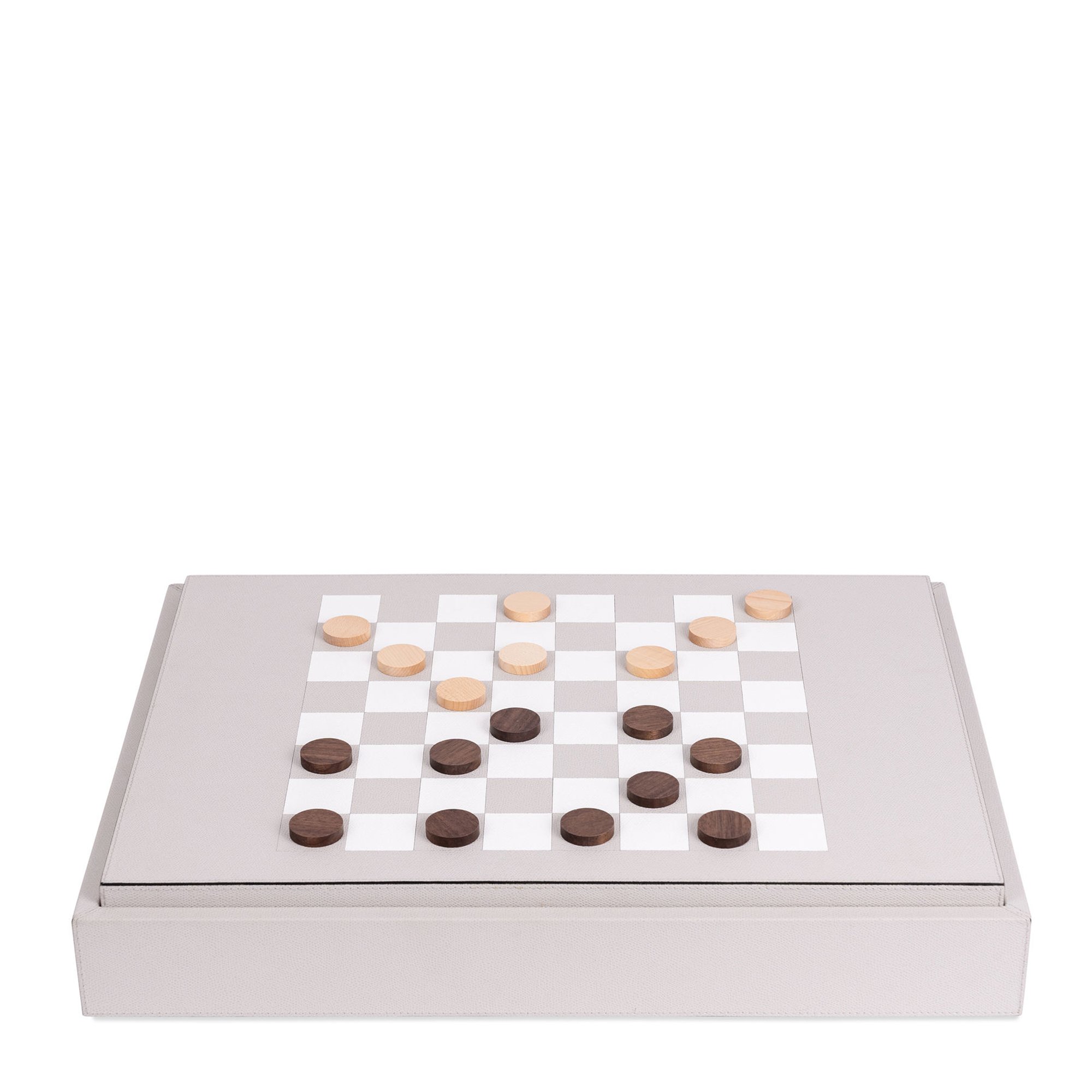 This leather-covered wooden game compendium is featuring a reversible board for four games—chess, dominos, checkers, and backgammon—the set includes game pieces in suede pouches, plus dice and two decks of cards.