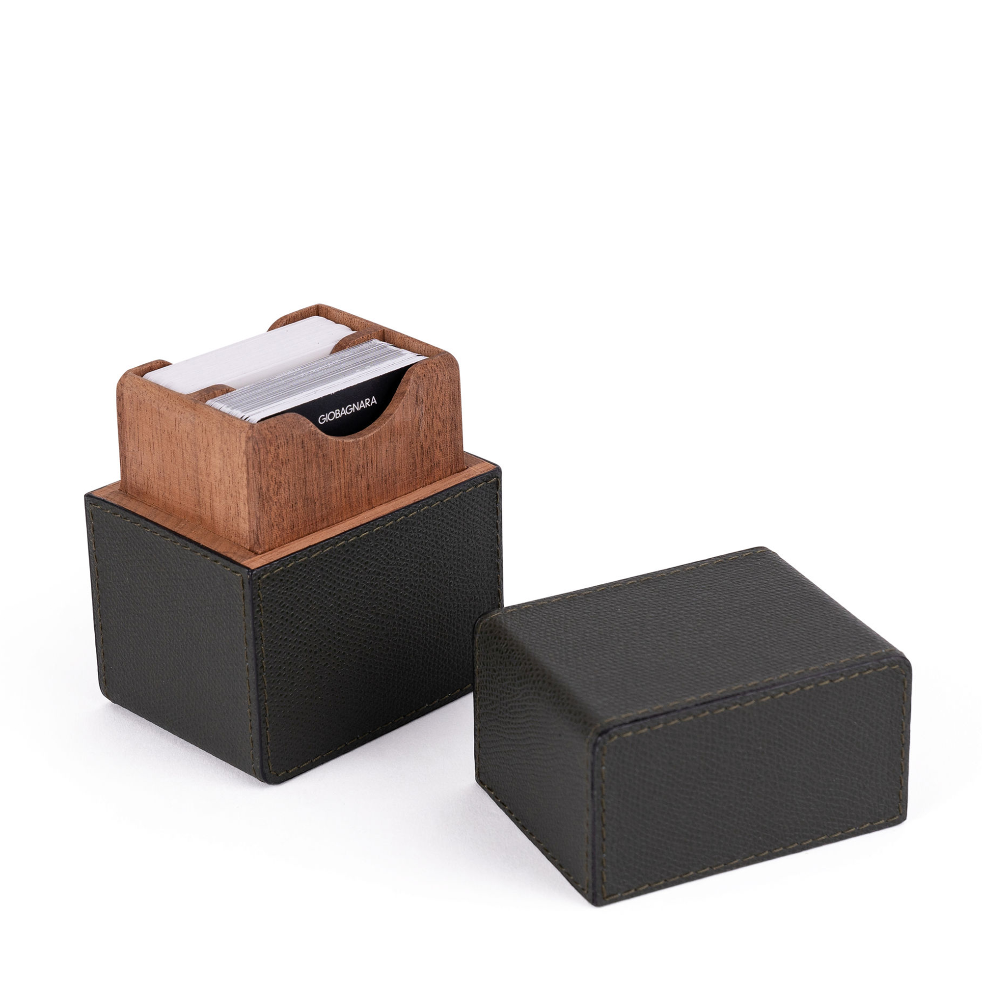 Handcrafted by expert Italian artisans, this stunning black card set includes two decks of playing cards housed in an elegant cedar wood and calfskin leather case.