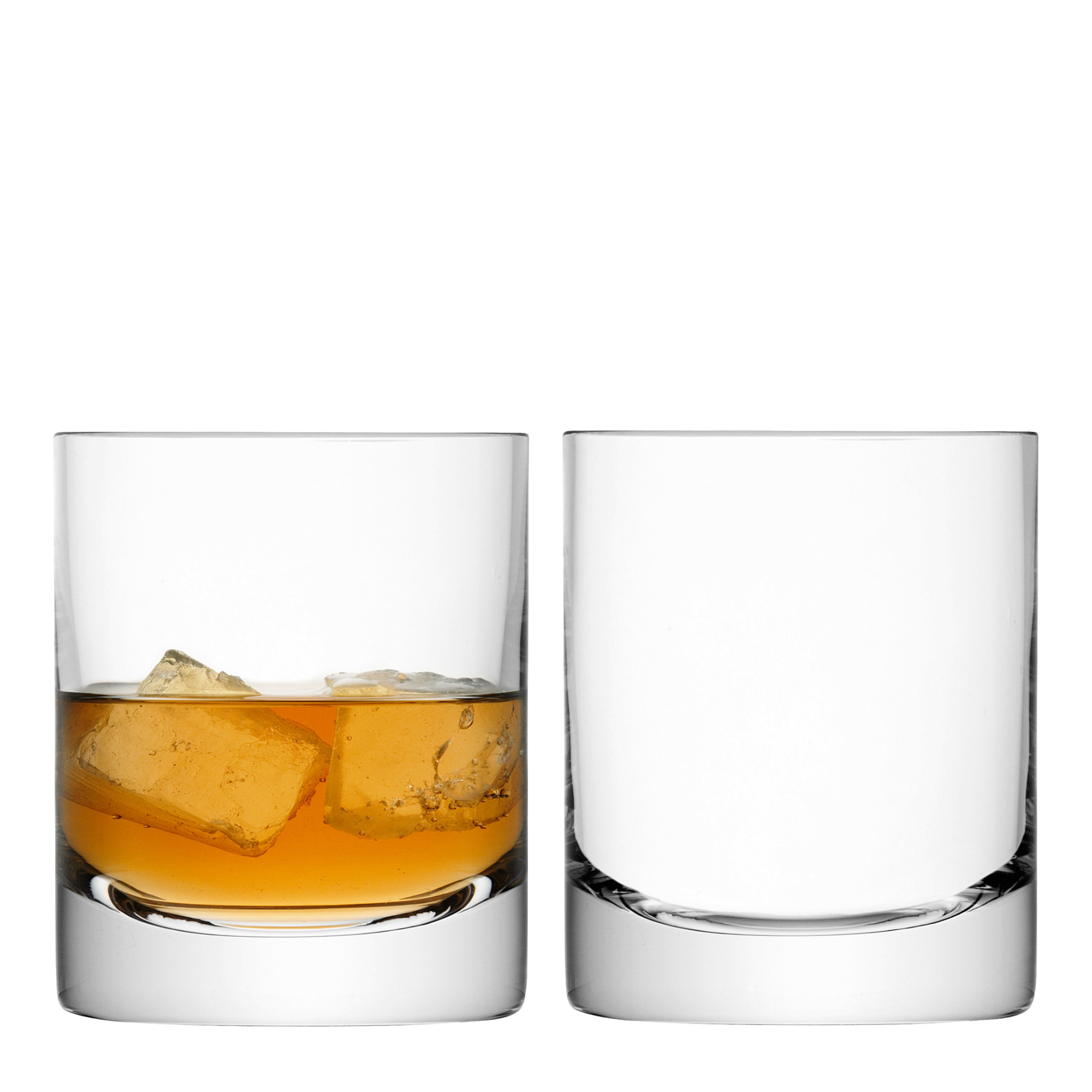 Set of four mouth-blown glass tumblers featuring a cylindrical shape, fine rims, and solid glass bases. Designed for whisky or short cocktails, combining contemporary style with timeless sophistication.