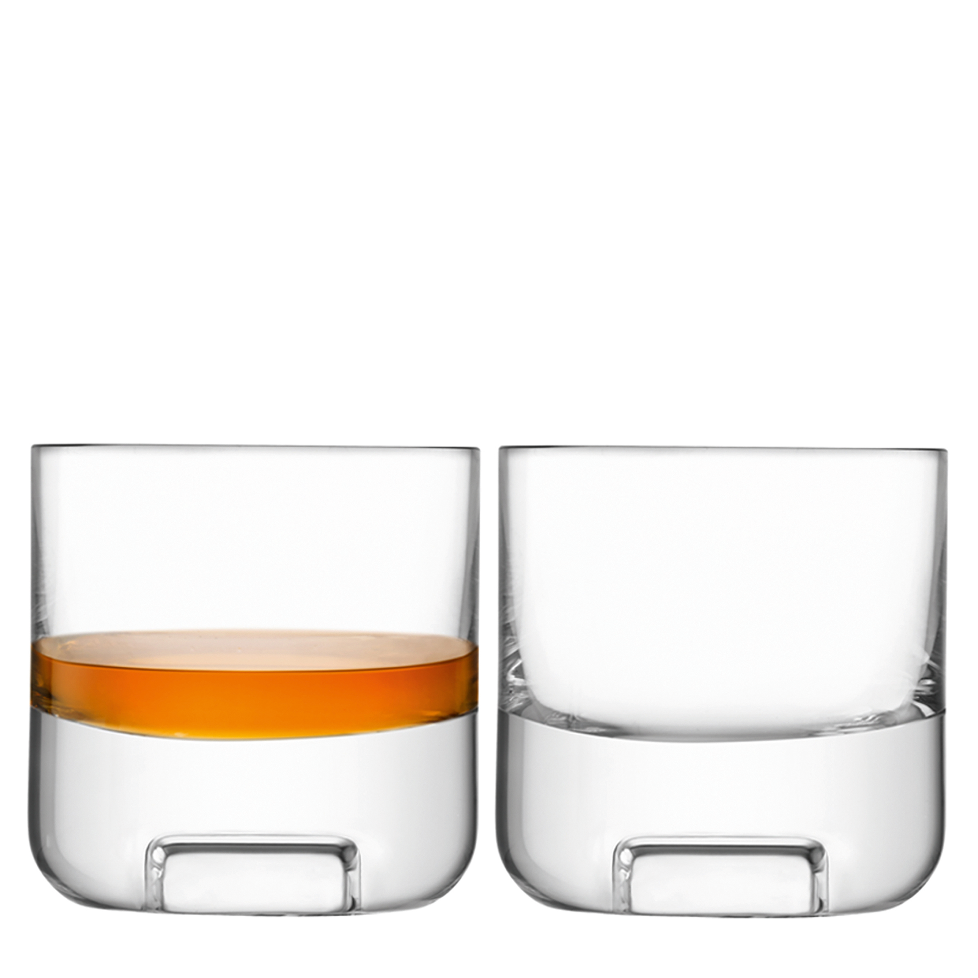 Pair of mouth-blown tumblers with fine, straight walls and a cube-shaped impression in the heavy, rounded base, resembling a large ice cube. Ideal for whisky or cocktails, offering contemporary style and timeless sophistication.