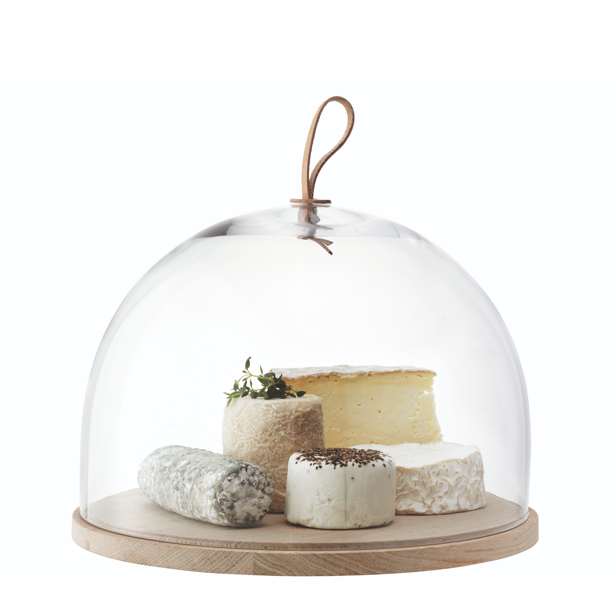 This wide, mouth-blown glass dome is paired with a natural wooden stand for serving cakes, cheese, or pastries. The ash wood stand is finished with a hand-knotted leather toggle, offering a contemporary mix of textures for modern food presentation.