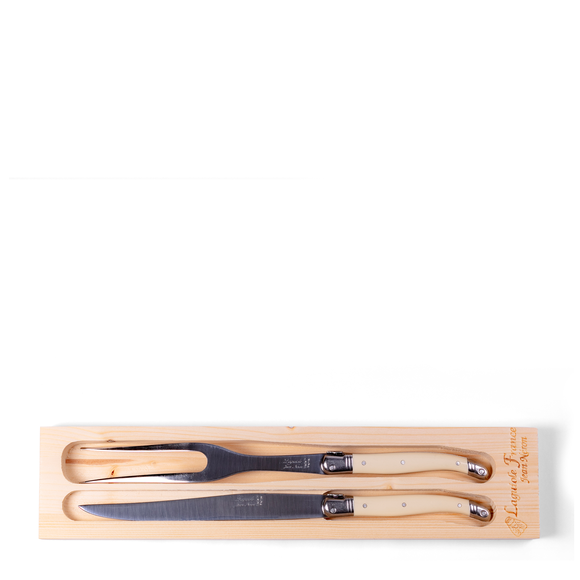 Carving Set hand-crafted in France by expert craftsmen, this two-piece set features a mirror finish and sleek ivory resin handles embossed with the bee detail synonymous with Laguiole. Perfect for carving a succulent Sunday roast or turkey at your next Thanksgiving.