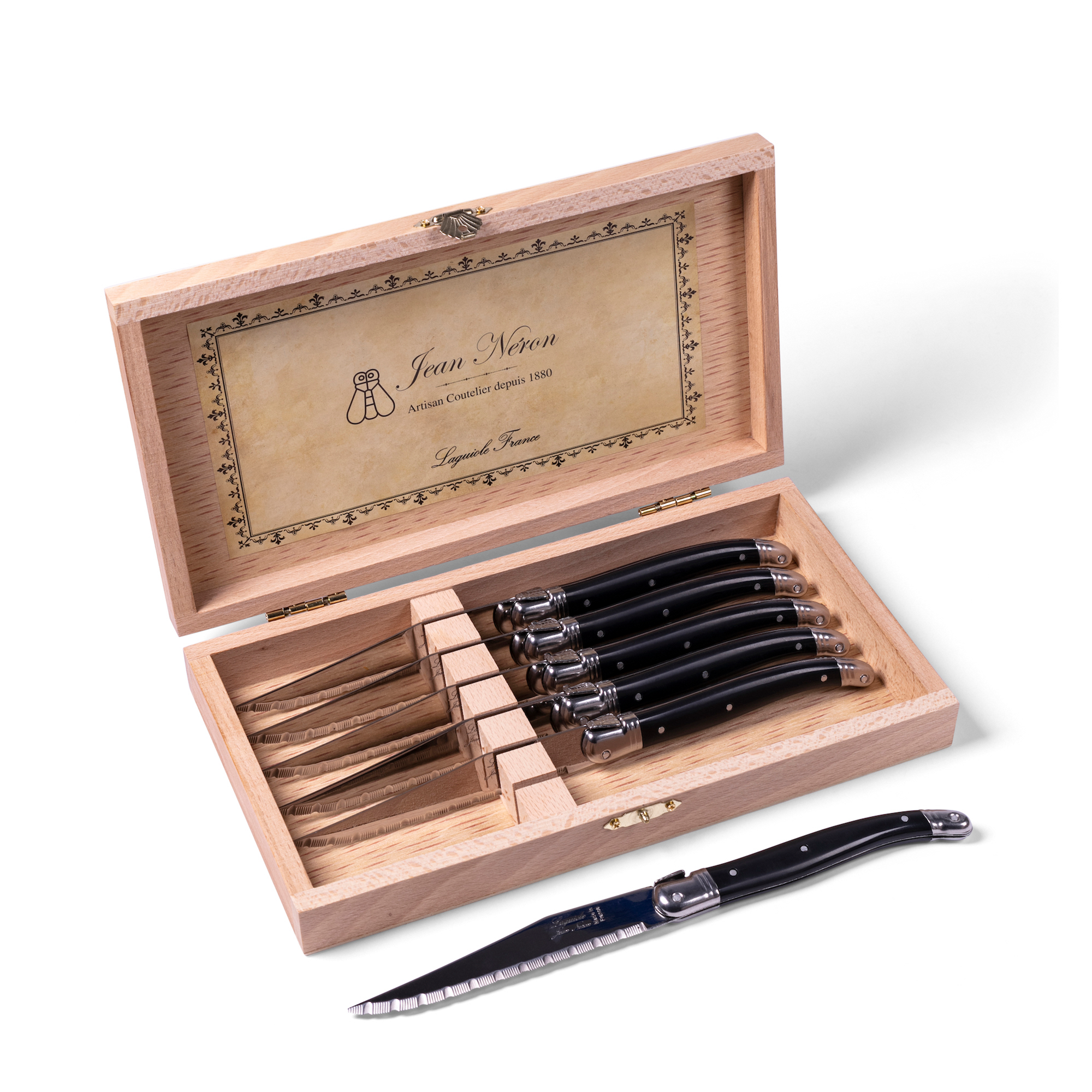 Steak Knives, hand-crafted in France by expert craftsmen, this six-piece steak knife set features mirror-finished blades and sleek black resin handles embossed with the bee detail synonymous with Laguiole.