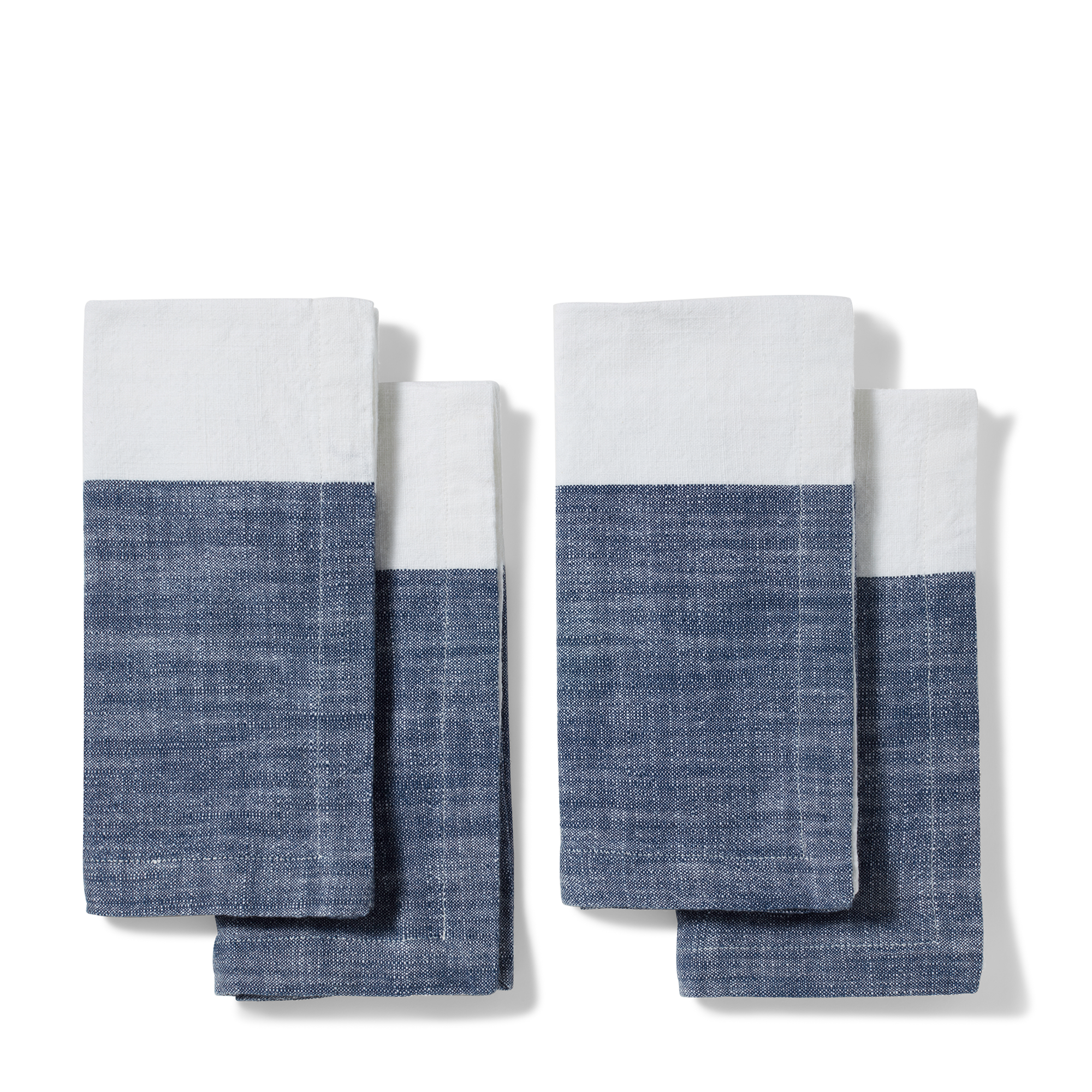 Indigo and white, versatile 100% cotton napkins with a color block design offering four stylish looks. Machine washable and wrinkle-resistant. Easy to fold and ready for your dinner party straight from the dryer.