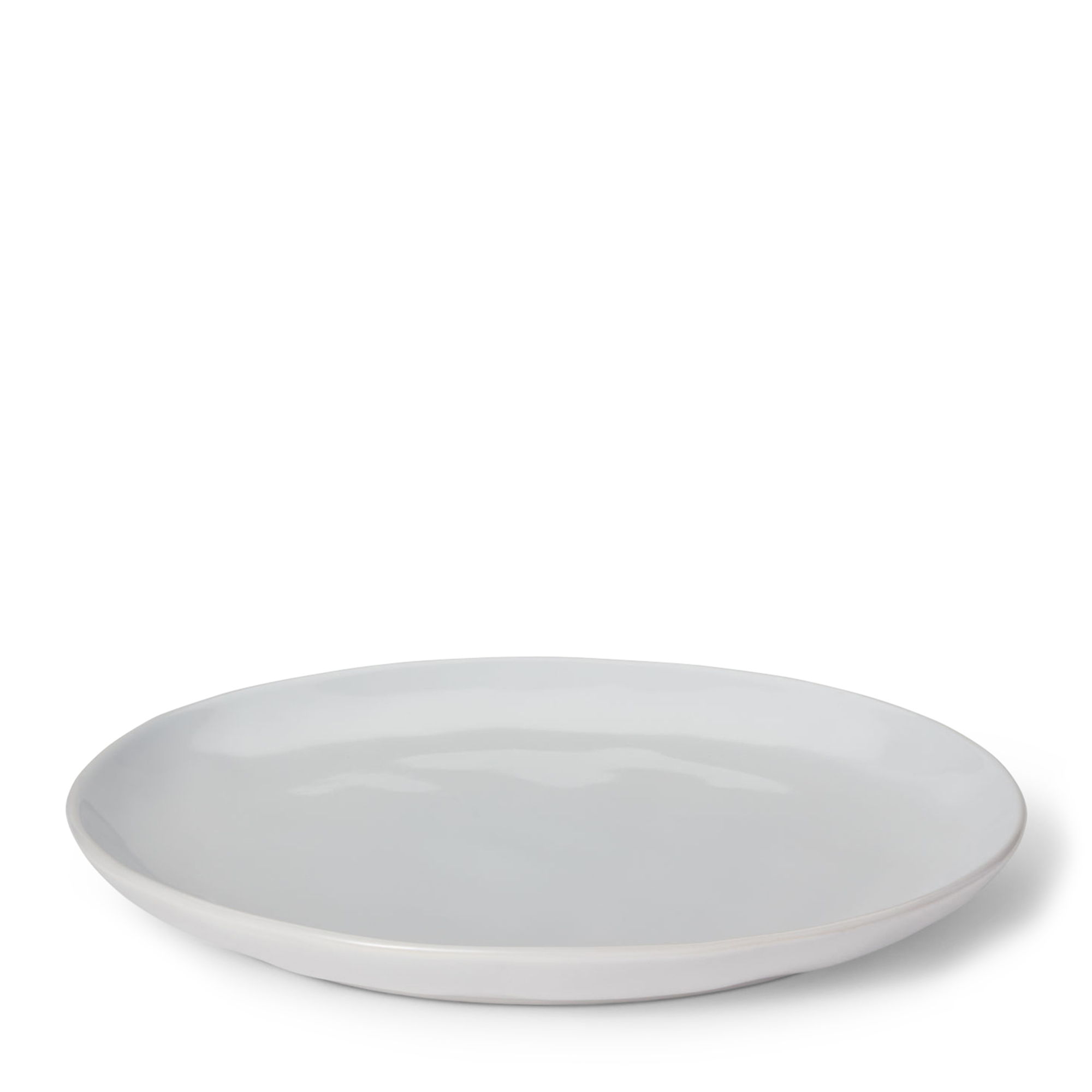 White dinner plate made of stoneware with a satin exterior finish and a glossy interior. Adds vibrant color and style to your table, countertop, and kitchen cabinet.