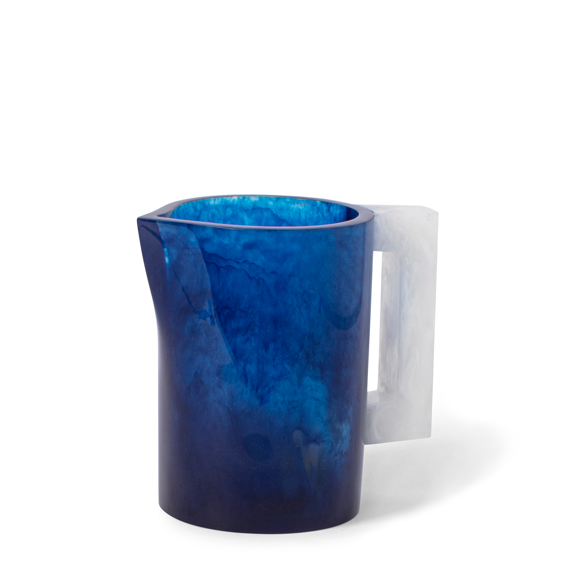 This Navy, Sky Blue and White playful pitcher, with its delicately dispersed color that becomes more vibrant as light passes through, adds charm to your festive summer dinner party. Handcrafted using high-quality polymer resin from the Philippines.