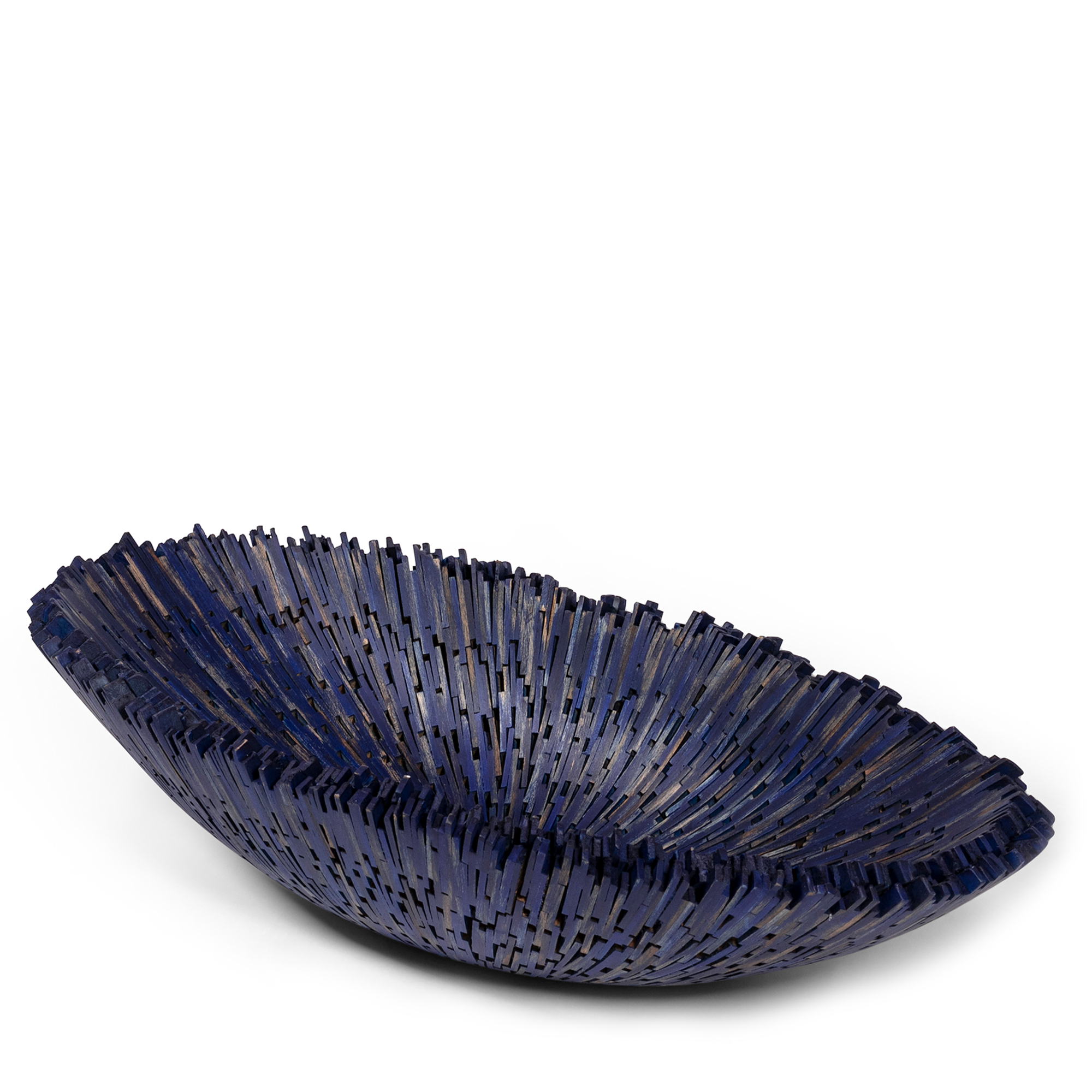 Inspired by the serene beauty of Boracay's beaches, this dark blue canoe-shaped bowl is handcrafted from hundreds of small pieces of mahogany wood, intricately and precisely fitted together. Made by gifted Filipino artisans using wood salvaged from fallen trees. With its soothing color and elegant design, it brings a touch of coastal charm to any table setting.