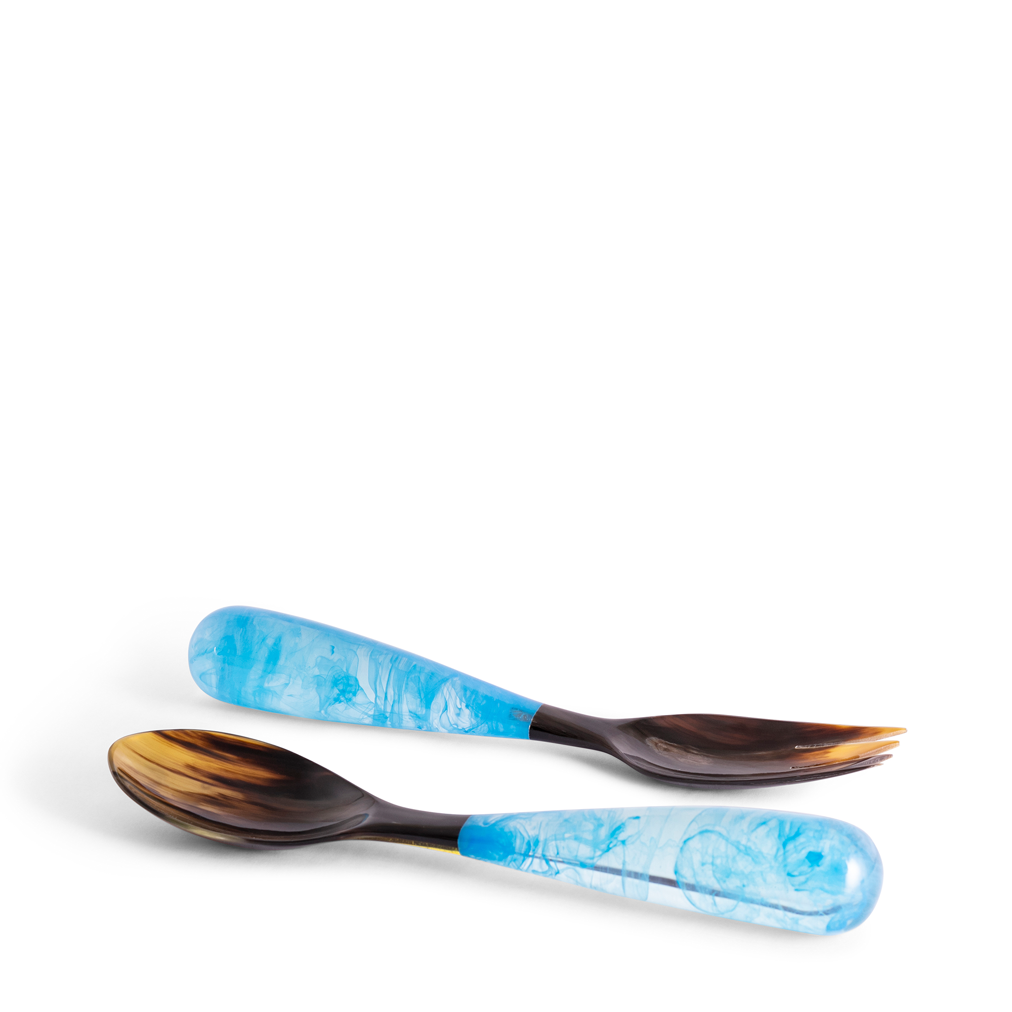 Ice Blue Grand Slam Servers, handcrafted from luminous, colorful resin and reclaimed water buffalo horn, these servers combine high-quality polymer resin with horn, offering a unique blend of beauty and durability.