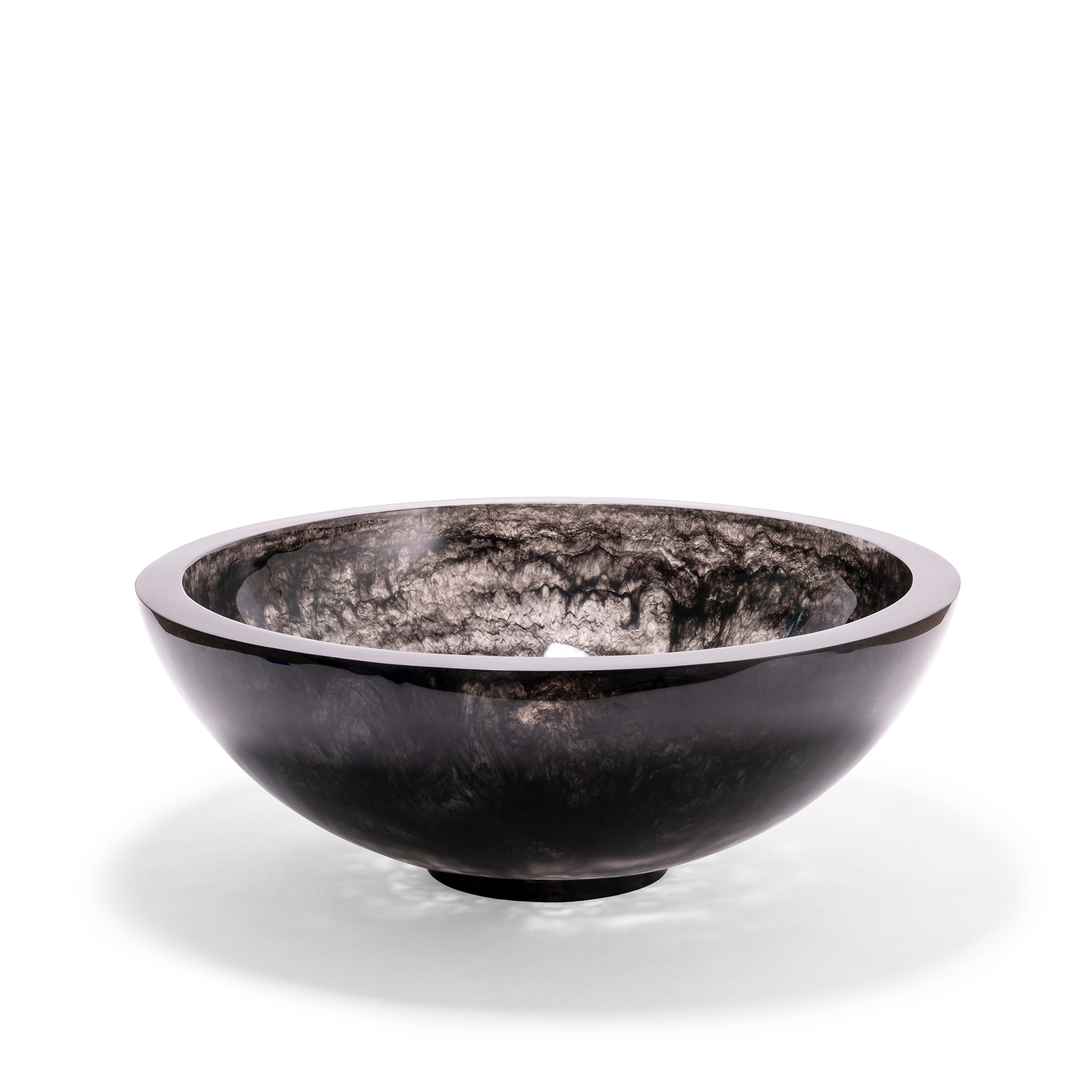 Charcoal Portofino Bowl has strong and simple shape, featuring dispersed color that becomes more vibrant as light passes through. Perfect as a fruit bowl, salad bowl, or decorative piece. Handcrafted using high-quality polymer resin from the Philippines.