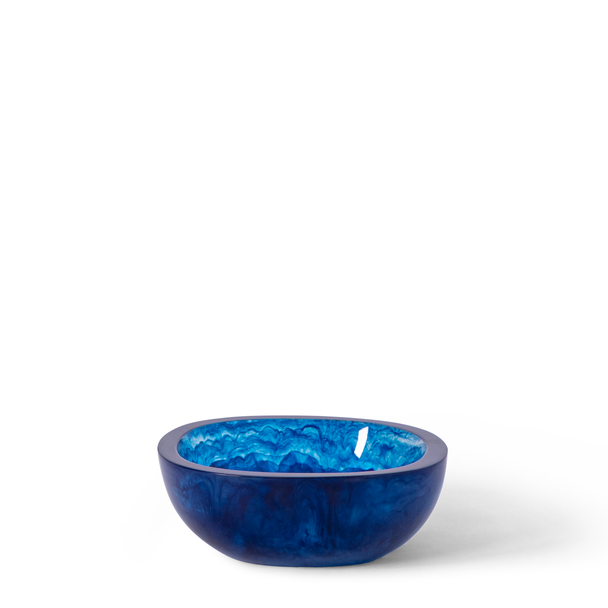 A vibrant, navy tapas bowl with a smooth, polished exterior and a deep, reflective finish that contrasts with the textured, swirling patterns inside the bowl. Perfect for serving snacks or dips.