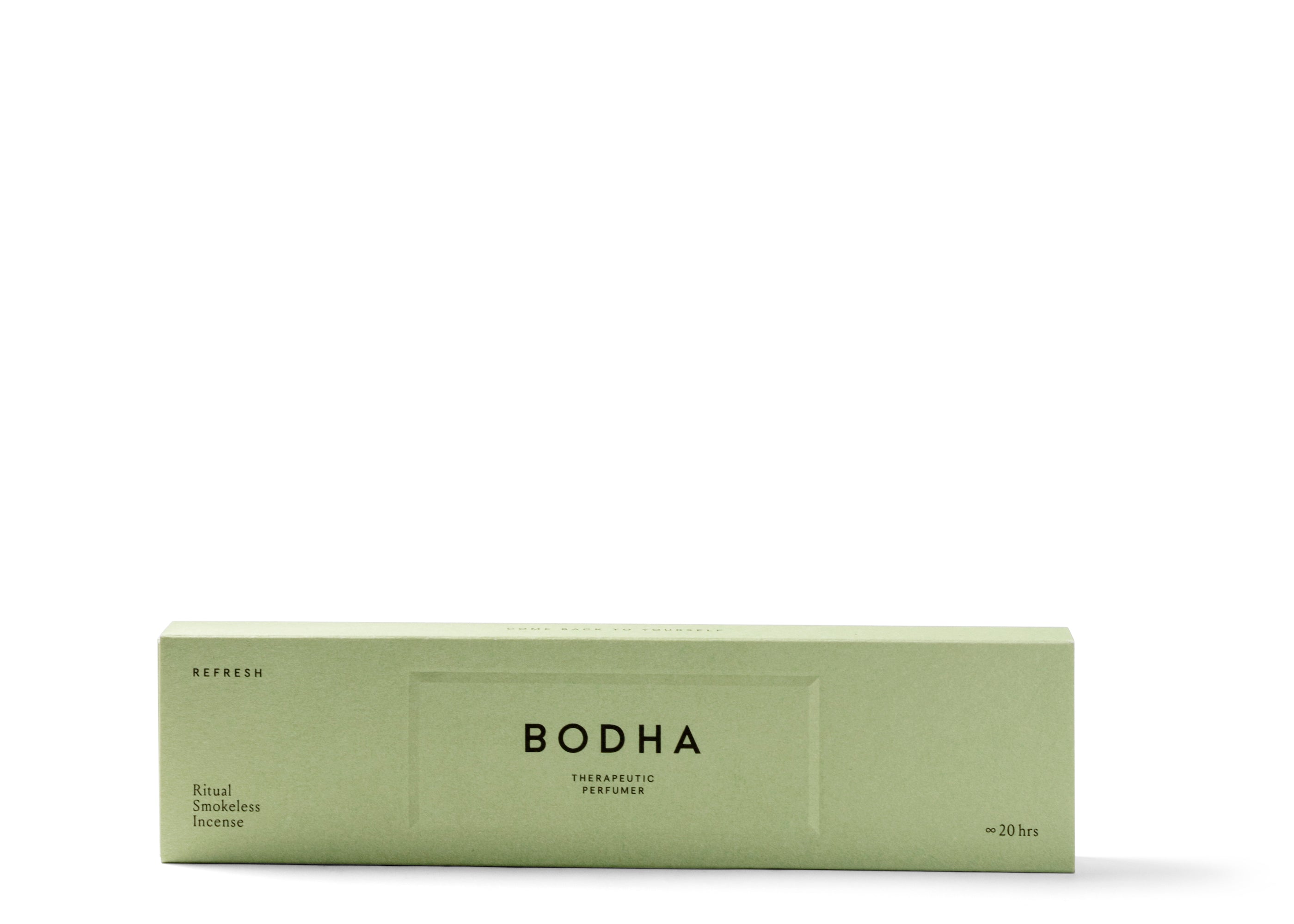 Smokeless incense sticks releasing aromatic scents, while inducing a revitalizing effect, all without producing visible smoke. Packed in a light green box.